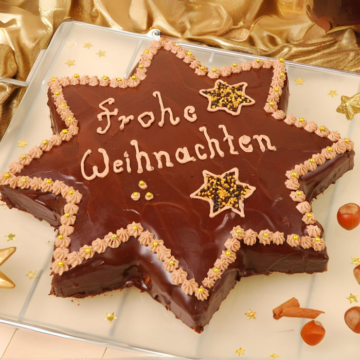 Nuss-Zimt-Stern mit Schokoglasur